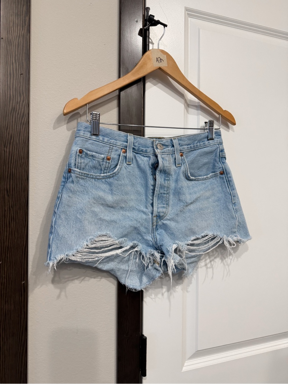 Levi’s Women’s Light Blue Distressed Denim Jean Shorts